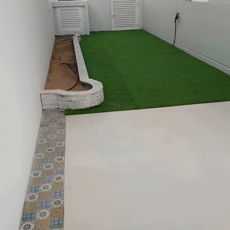 Create a tranquil and inviting outdoor oasis with lush greenery and thoughtfully designed landscaping. https://ideallandscapers.com/