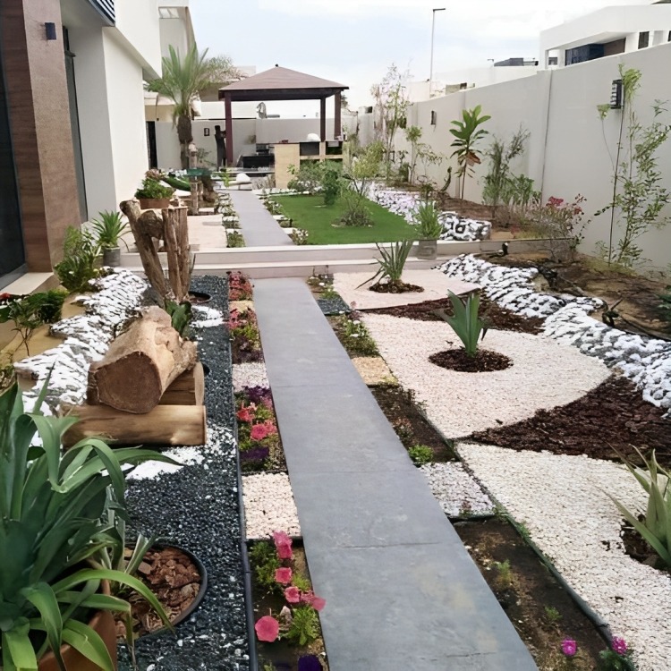 Create a serene and tranquil ambiance with mesmerizing water features, adding a touch of nature's tranquility to your landscape. https://ideallandscapers.com/