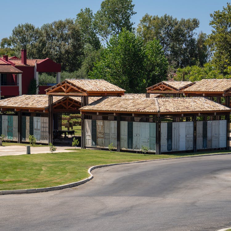 Enjoy the shade and ambiance of a pergola-covered patio get our landscaping services https://ideallandscapers.com/